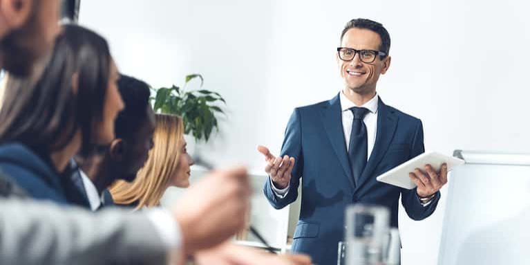 Executive Leadership In Front of Team