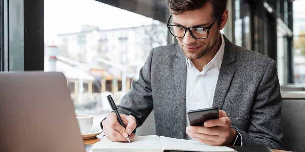 A family business owner taking notes on think differently business ideas